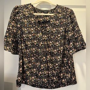 Sanctuary floral top from Nordstrom Rack. Worn a few times. 100% polyester.